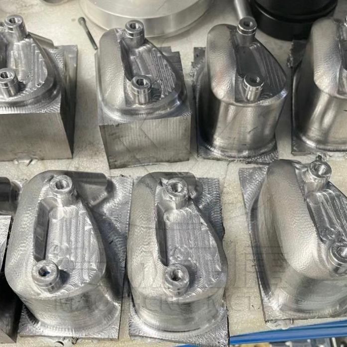 What are the 3 key components of a CNC machine?